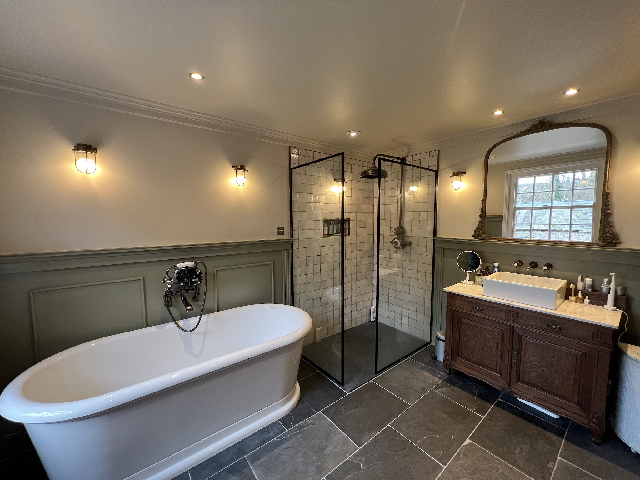 Finished bathroom with freestanding tub and walk-in shower