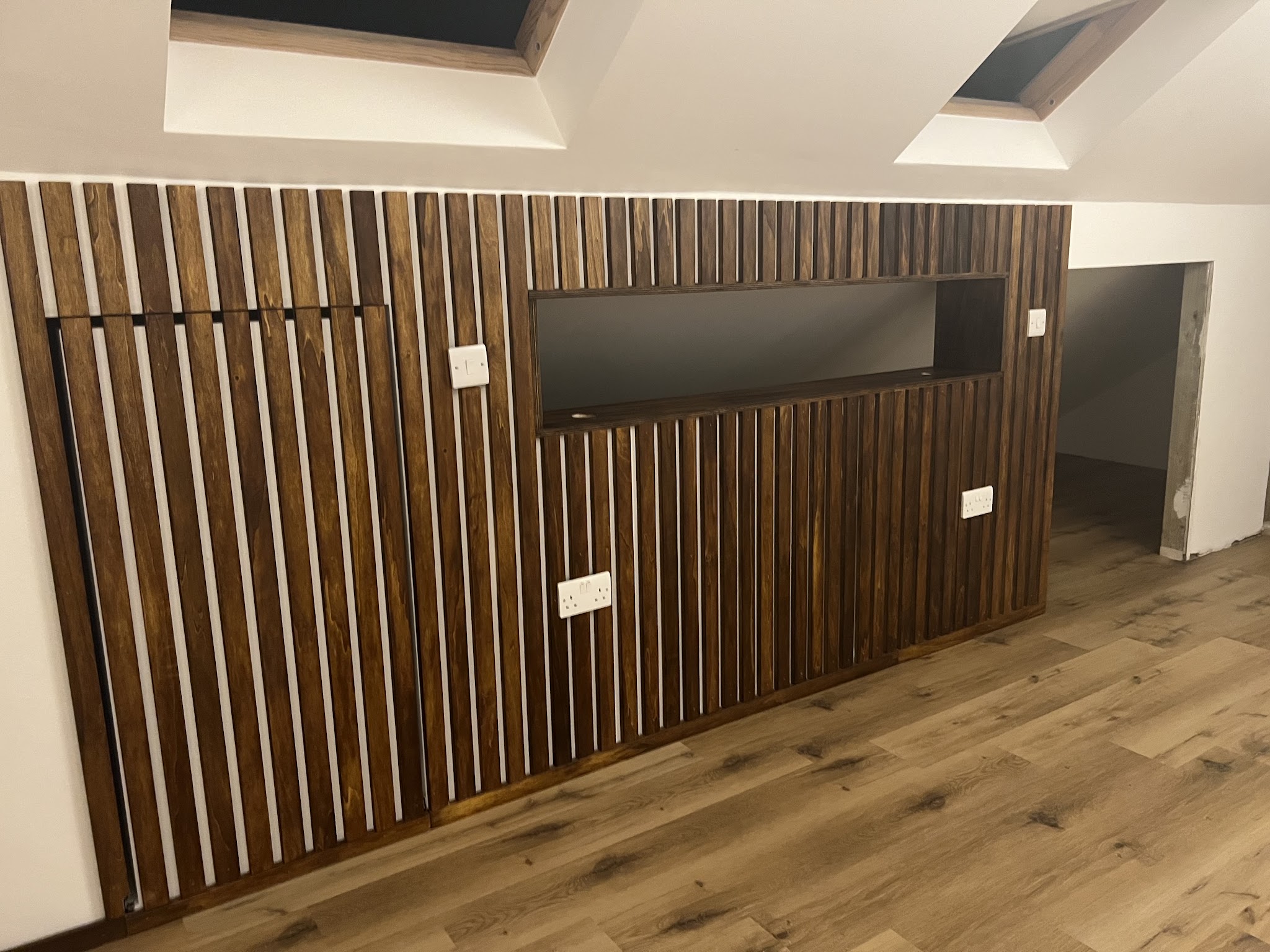 Timber slat feature wall with recessed shelf