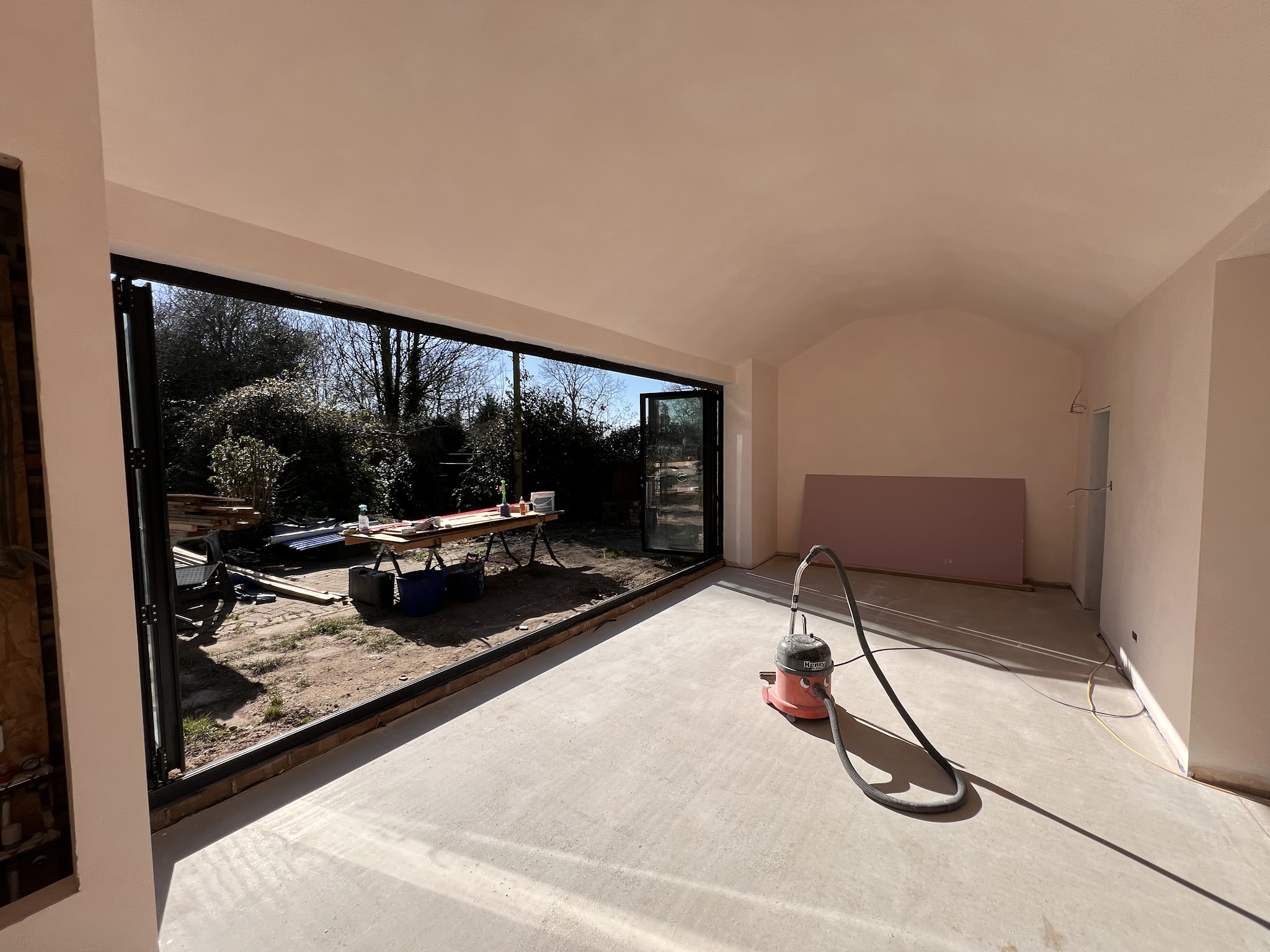 Wide bifold patio doors opening onto the garden